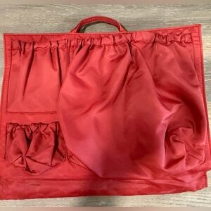 Red ToteSavvy bag organizer with insulated pocket for milk bottle & changing pad